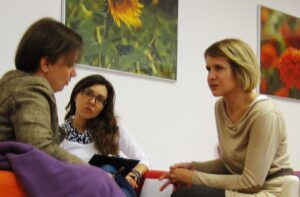 three women in empathic conversation
